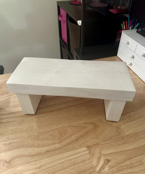 white wooden step stool